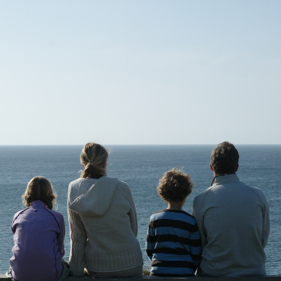 Family looking at the ocean.