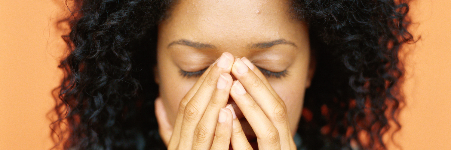 What ‘I Literally Can’t Even’ Means to Someone With Depression Young woman holding hands over mouth, close-up