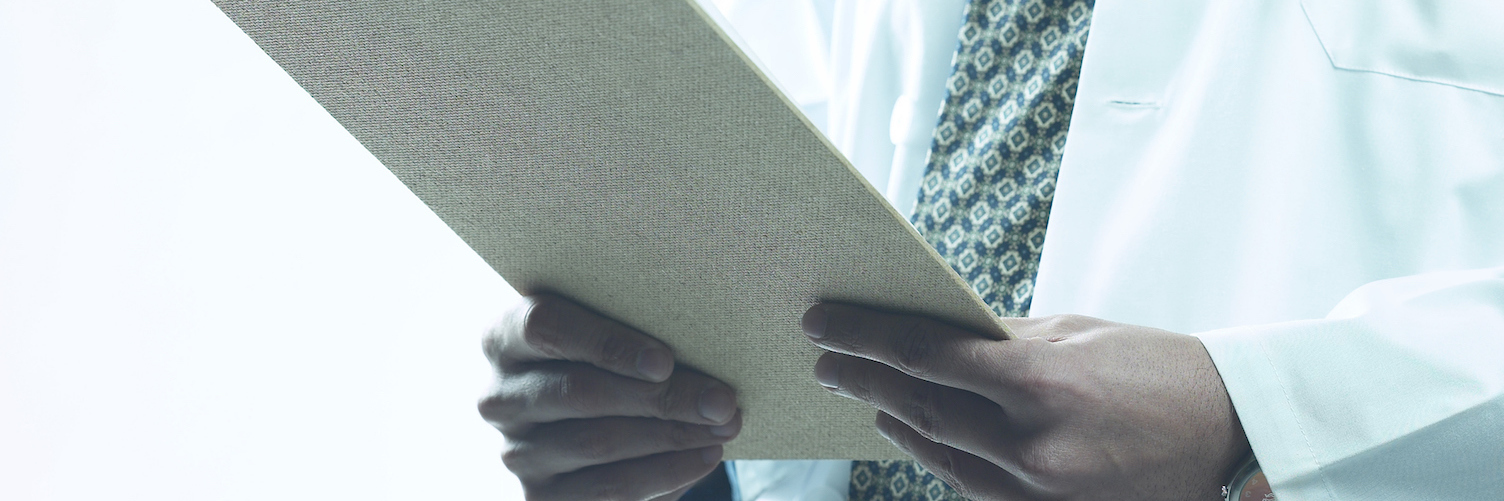 5 Times I'm Reminded I Have a Rare Disorder Doctor holding clipboard