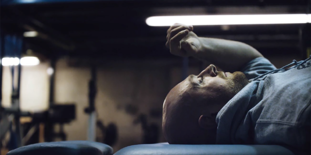 Mike Stella works out in a scene from the short documentary "Coach Stella."