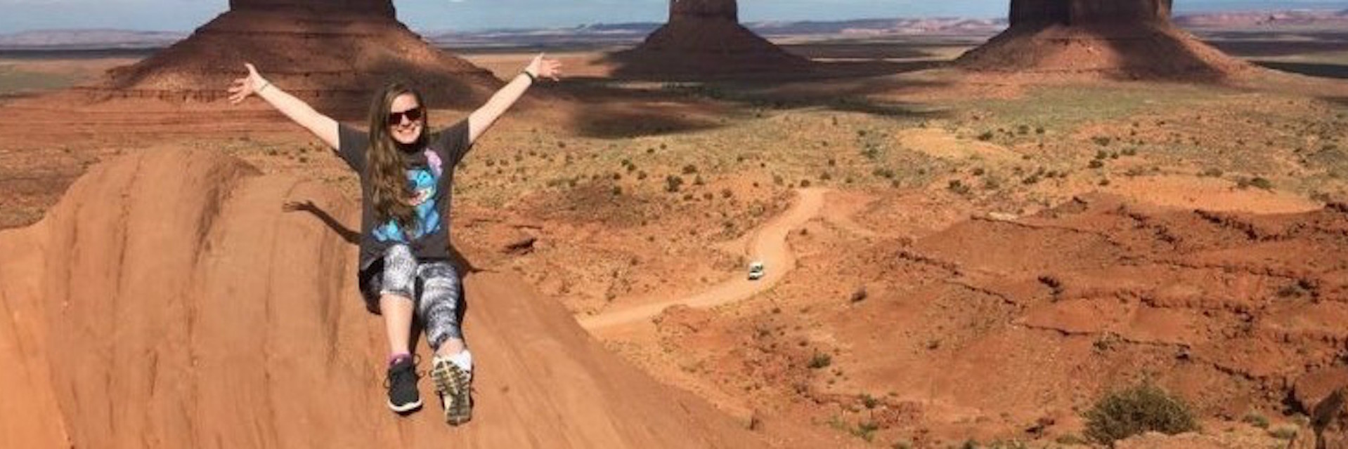 Why I'm Not Angry and Don't Resent My Chronic Illness woman sitting on top of a hill in the desert