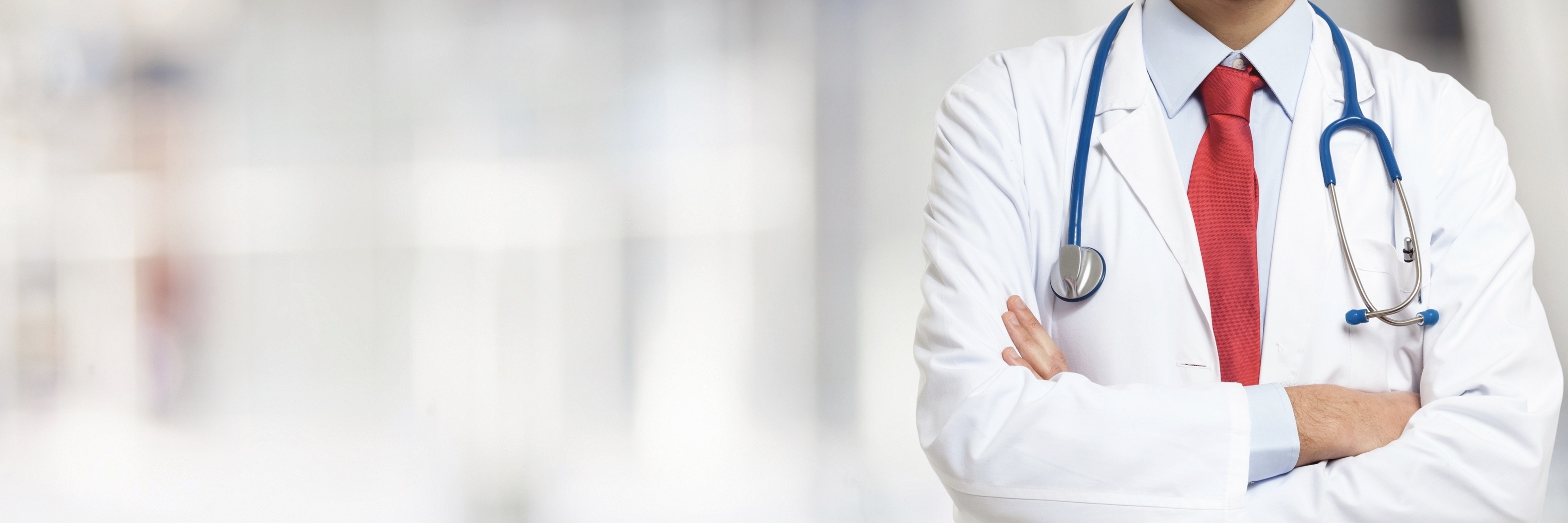 Gastroparesis: Letter to GI Doctor Who Did Not Believe My Symptoms doctor with stethoscope around his neck and arms crossed