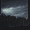 a window showing a dark sky