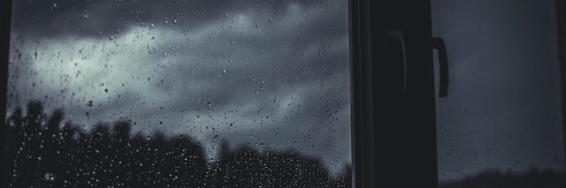 a window showing a dark sky