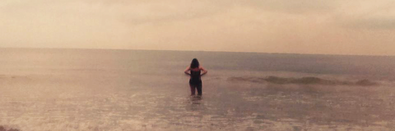 Finding Balance Through the Ebb and Flow of Anxiety A woman in the ocean