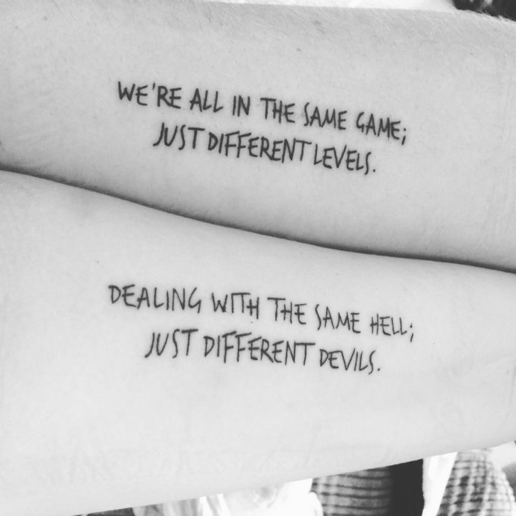 partners matching tattoos of quote