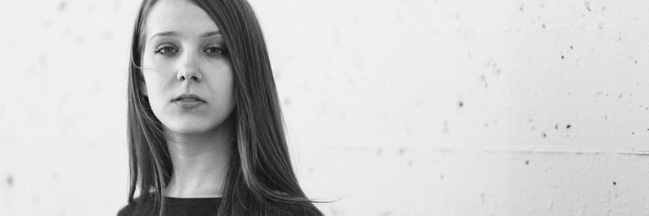 The 'Catch-22' of Mental Illness: Can Anyone Truly Understand? woman black and white photo