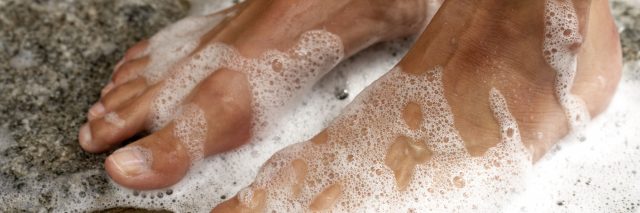 woman's feet in shower