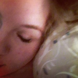 woman asleep in bed