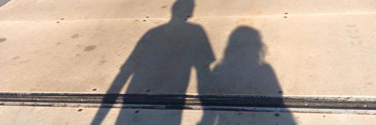 To My Husband With Bipolar Disorder: I Will Never Stop Choosing You holding hands shadow