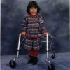 Charisse Hogan, childhood photo of her using a walker.
