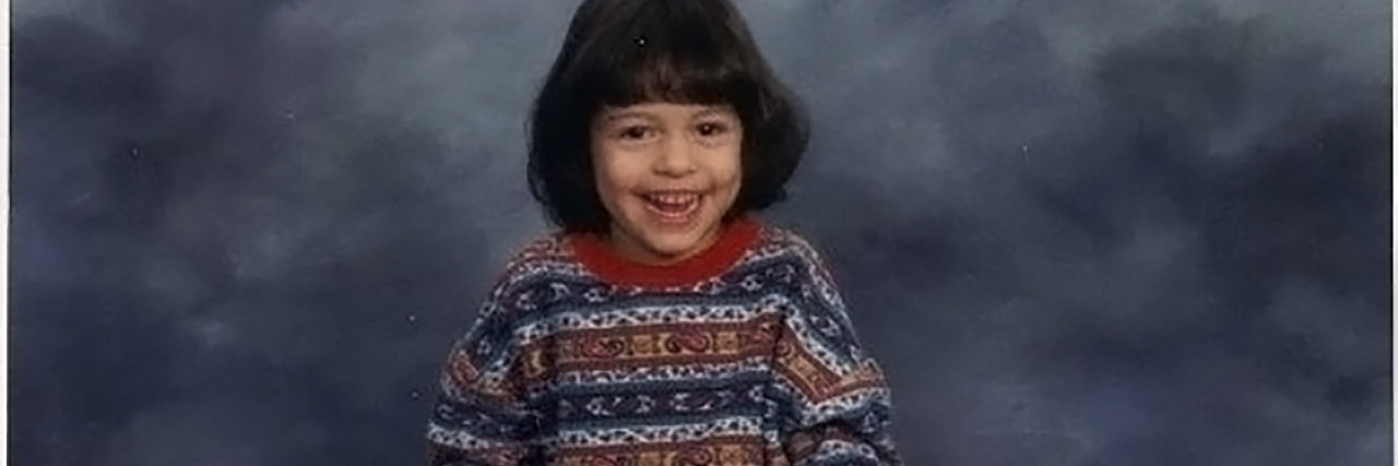 Charisse Hogan, childhood photo of her using a walker.