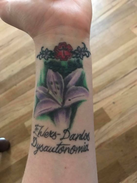 flower medic alert tattoo that says 'ehlers-danlos and dysautonomia'