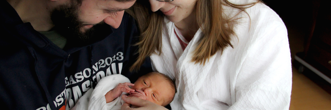 Getting Pregnant With an Increased Risk of Postpartum Depression Parents with their newborn baby