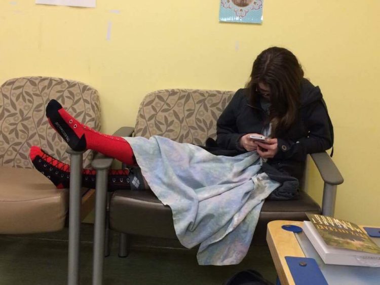 woman sitting in the waiting room before surgery