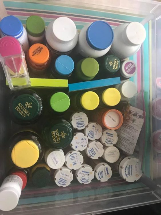 drawer of medications and pill bottles