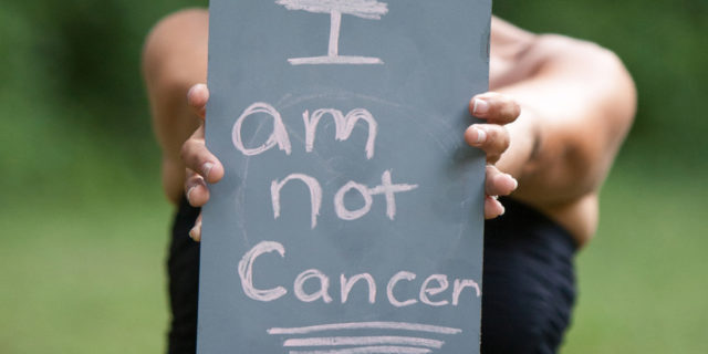 Why I'm Sick of Talking About Breast Cancer but Will Never Stop AnnMarie Otis I am not cancer photo