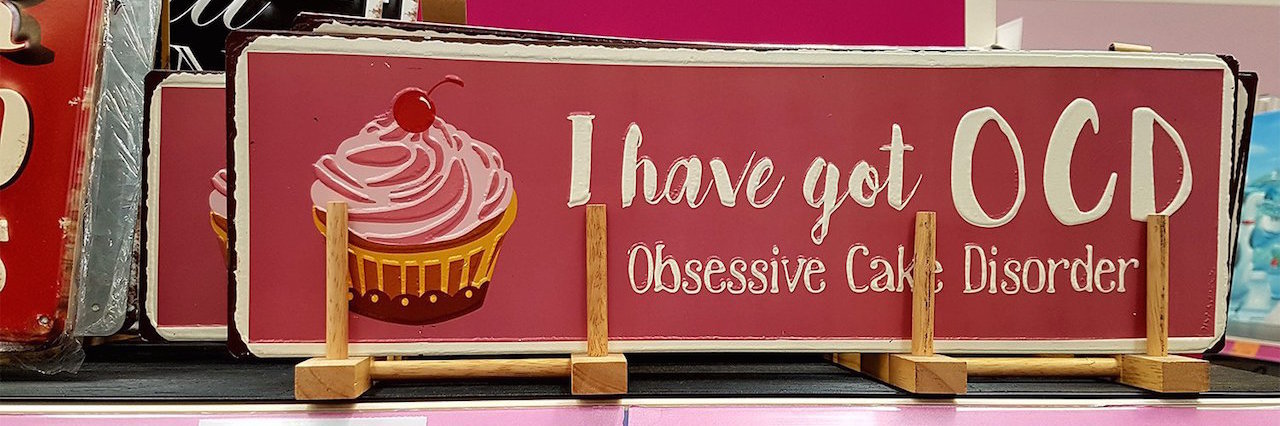 product that says: I have got OCD. Obsessive Cake Disorder.