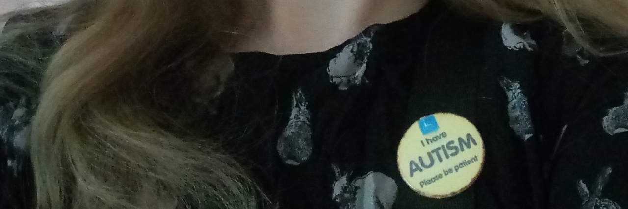 Effects of Wearing a Badge Announcing My Autism Lucy wearing her autism badge.