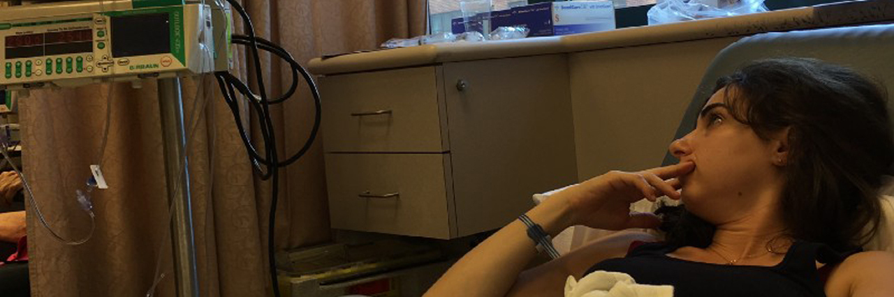 How My Body Became a Stranger During Hodgkin's Lymphoma Treatment woman with cancer in hospital bed