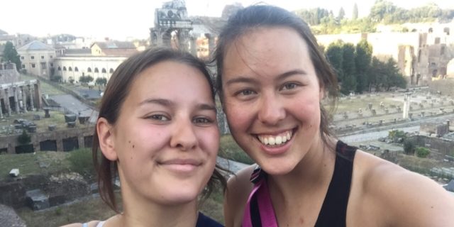 How Travel Planning Changes With Lupus two women taking a photo in front of the roman forum