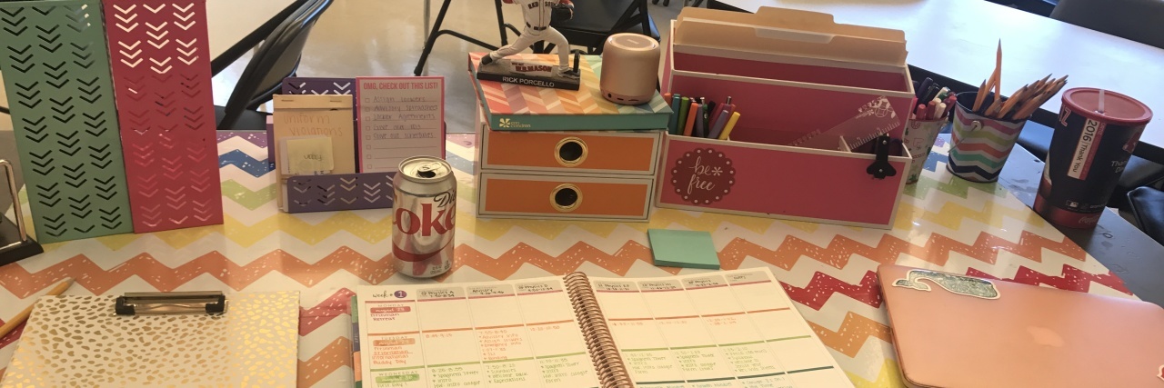 teacher's desk with lesson plans
