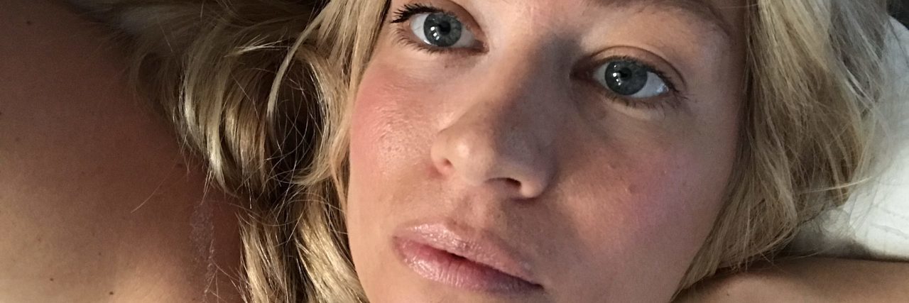 Ehlers-Danlos Syndrome: Fighting Chronic Pain Makes Me a Warrior woman with blonde hair in a white tank top