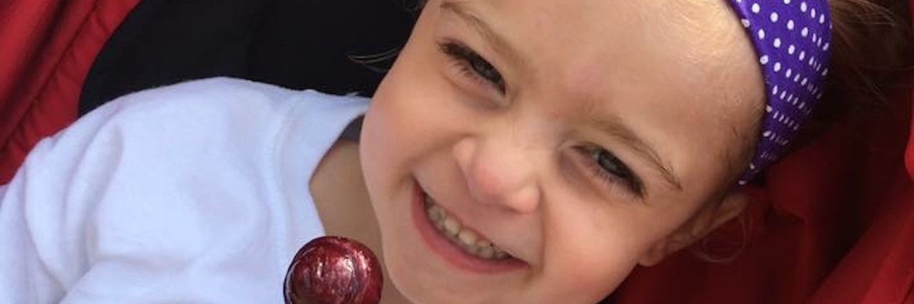 young girl participating in a walk for crohn's disease