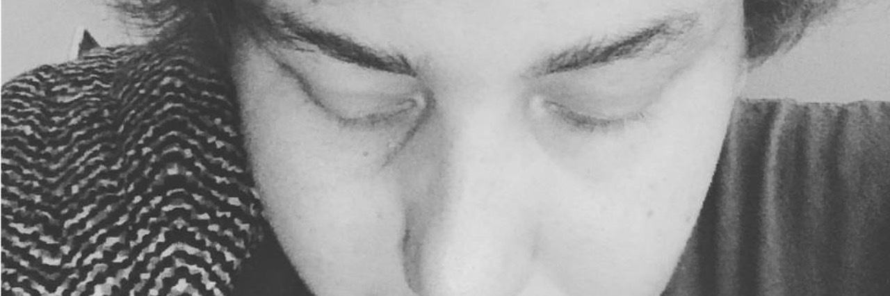 ER Doctors Dismissing My Pain Because I'm Young and Overweight black and white photo of a woman with her eyes closed