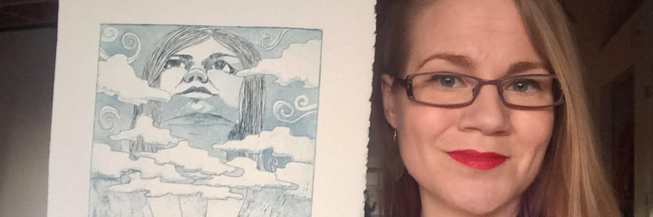 How I Realized There Is No Shame in Being Ill The writer holding up a sketch she drew.