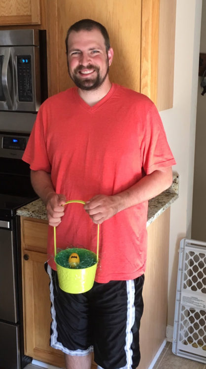 testicular cancer survivor Holding Easter Basket