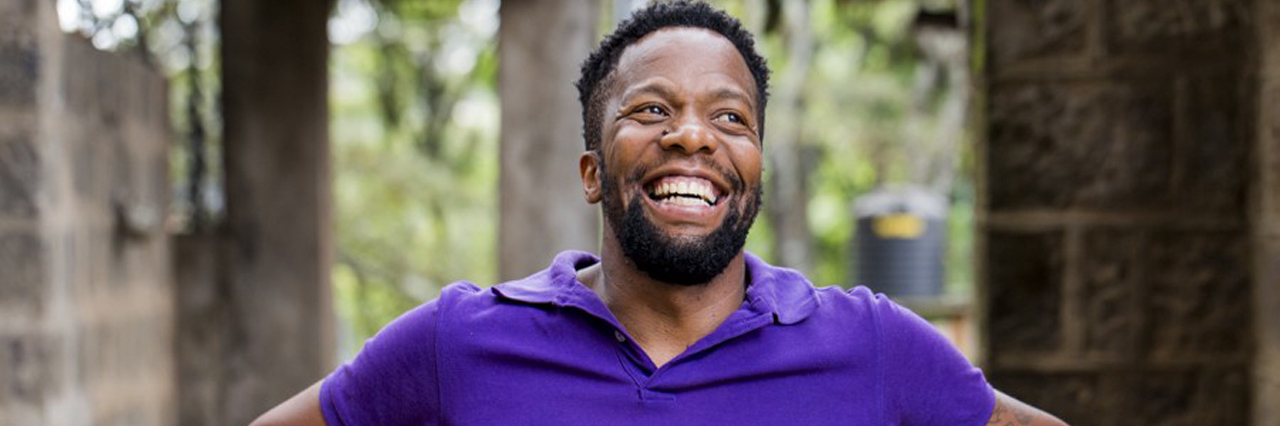 male cancer survivor smiling