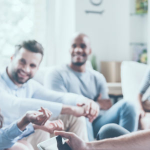 Group of people sitting and talking