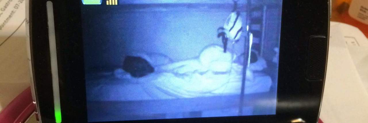 The Worry I Feel When My Son Sleeps In Video monitor image of child