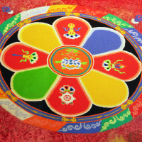 Tibetan mandala on a red background.