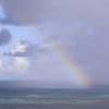 rainbow over the ocean after a storm