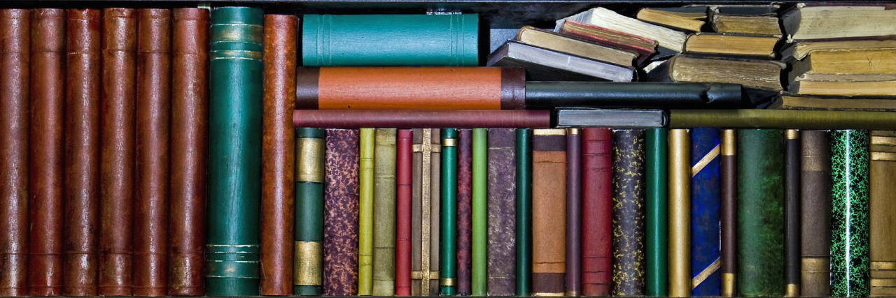 How Literature Portrays Disabled People LIbrary of brightly-colored books.