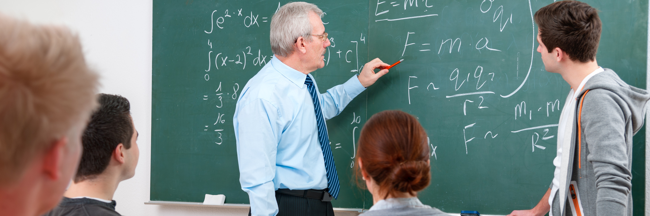 Surviving College With Complex Regional Pain Syndrome (CRPS) professor writing on chalkboard and teaching students