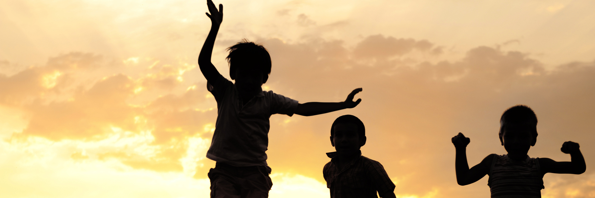 20 'Unexpected' Coping Techniques to Manage a Child's Cancer Diagnosis Children running on meadow at sunset