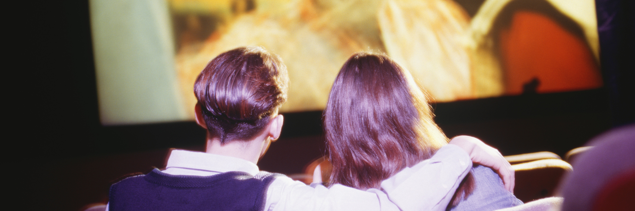 Nondisabled People Need to Learn About Disability Rights Couple watching a movie.