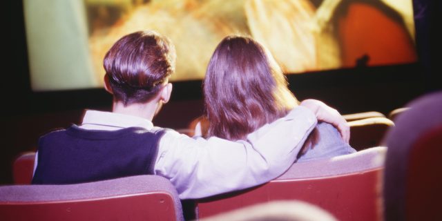 Couple watching a movie.