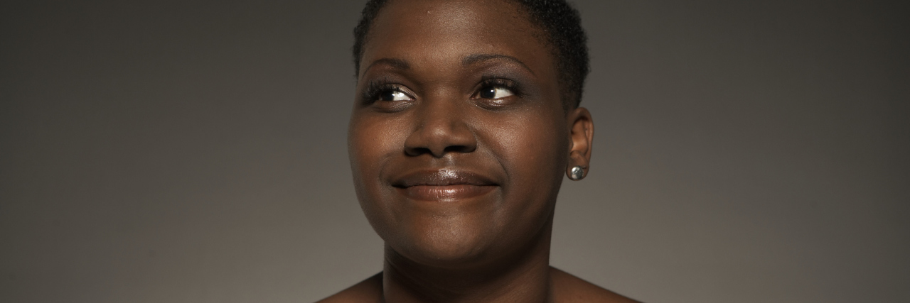 When a Woman Thanked Me for Smiling Through My Pain A smiling African American woman.