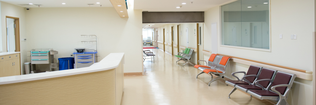 When Anxiety Visits Me in Waiting Rooms Empty nurses station in a hospital.