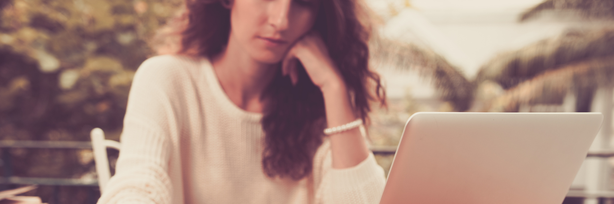 4 Tips for Starting College With a Chronic Illness Woman working at her computer.