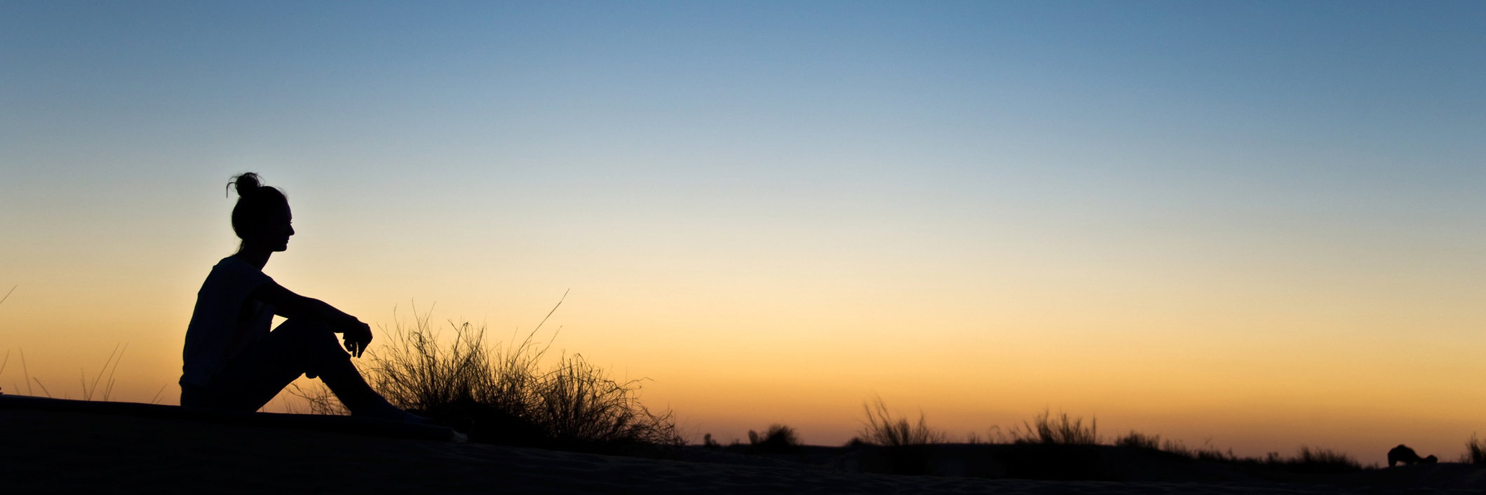 50 Things I Learned From My Dad's Esophageal Cancer and Death Silhouette of a woman sitting in the sunset