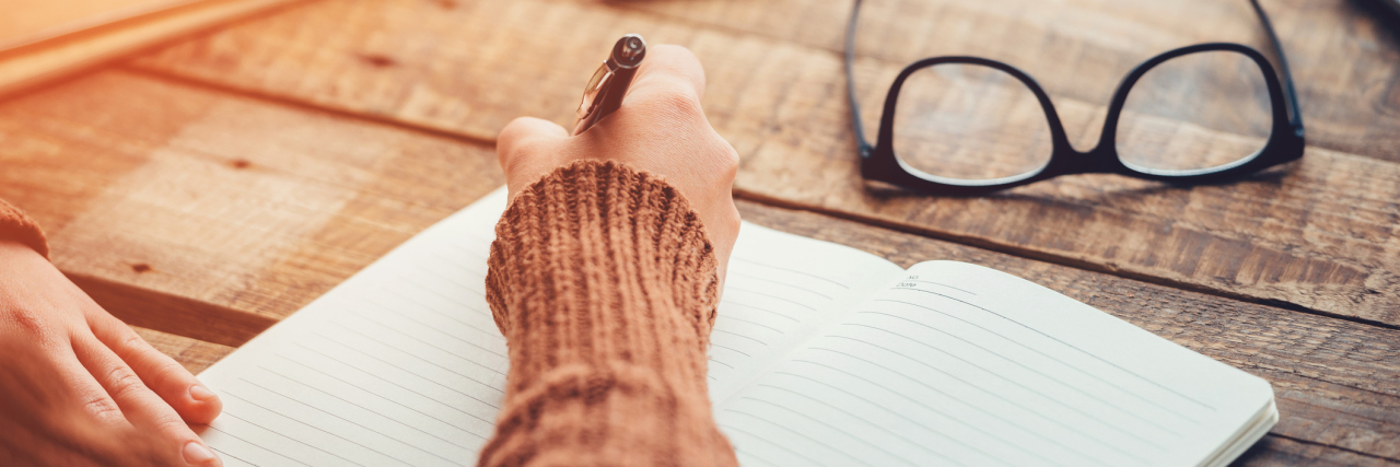 Psychogenic Non-Epileptic Seizures: Struggling to Tell Your Story woman writing in notebook