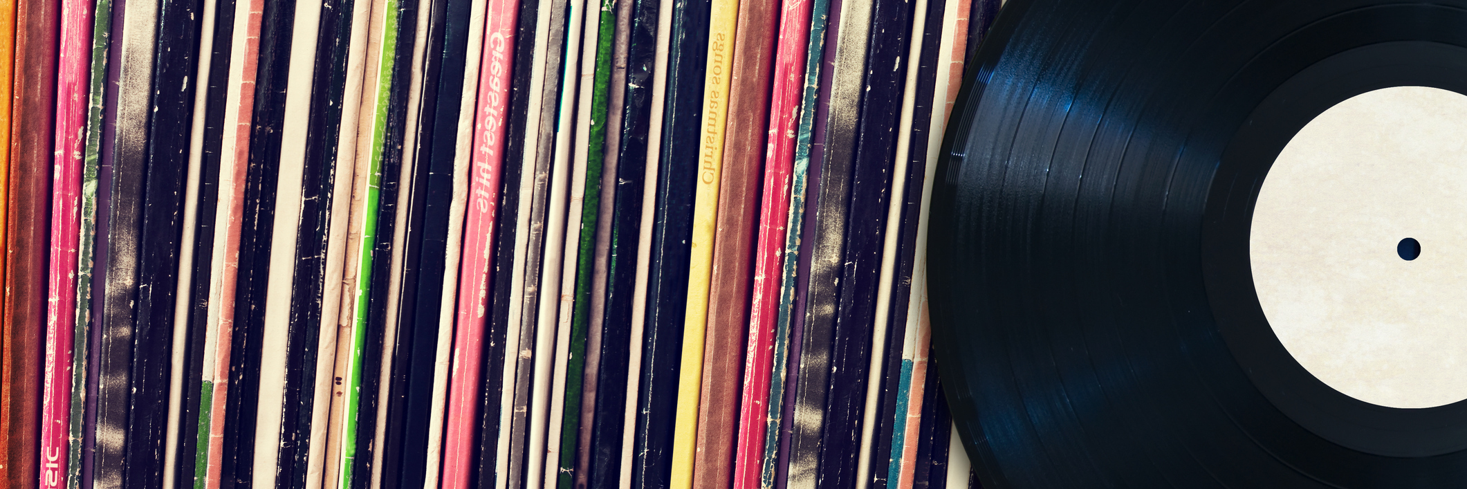 How My Illness Relates to This Song From 'Mamma Mia!' A record in front of record cases on a shelf.