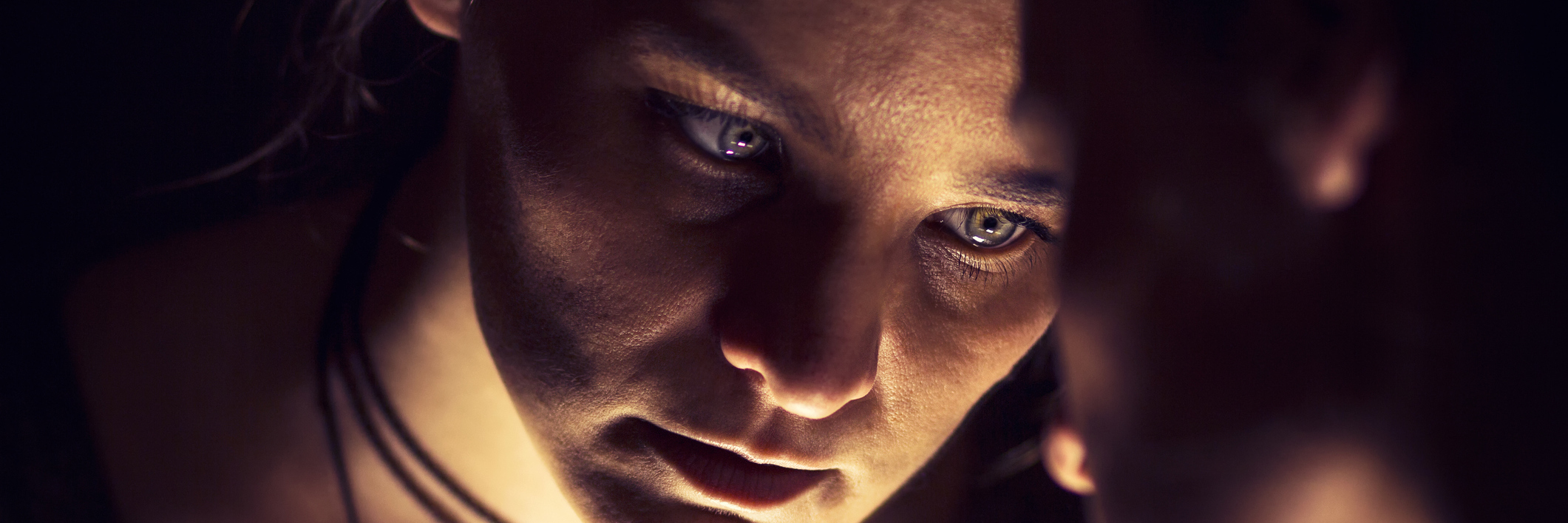 When You're Ill, It's OK Not to Be OK A woman leaning against a mirror, looking at her own sad reflection.