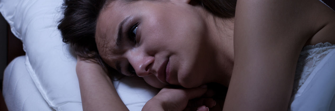 When You Can't Sleep Due to Suicidal Thoughts From Chronic Pain woman lying awake in bed at night