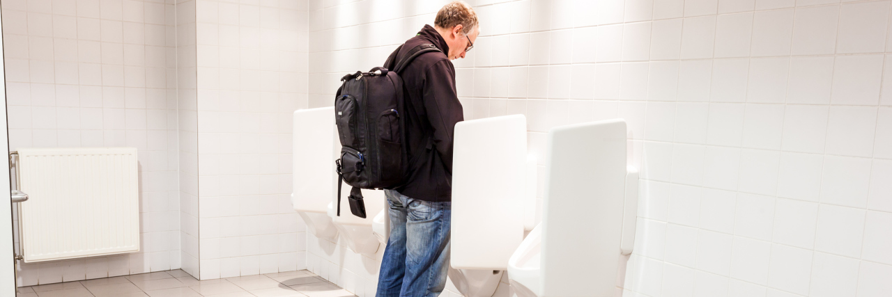 Using Catheters After Botox Injections in Bladder Caused Retention man standing at urinals